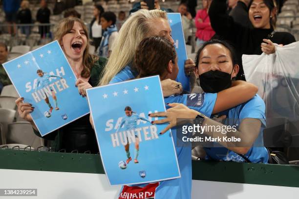 Sarah Hunter of Sydney FC celebrates with supporters in the crowd as she celebrates victory during the A-League Womens match between Sydney FC and...