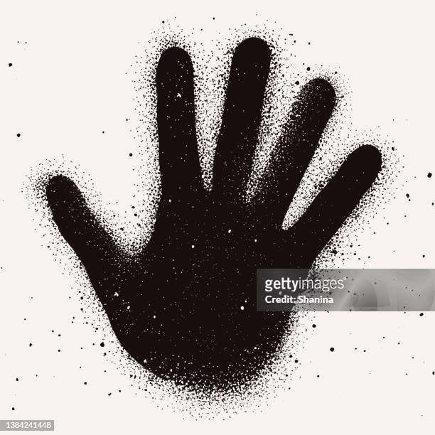 black open hand spray-painted over white background - spray on hand stock illustrations
