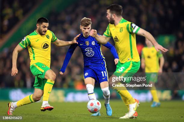 Timo Werner of Chelsea and Ozan Kabak of Norwich City compete for the ball during the Premier League match between Norwich City and Chelsea at Carrow...