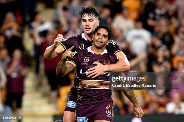 Albert Kelly of the Broncos celebrates scoring a try during the round one NRL match between the Brisbane Broncos and the South Sydney Rabbitohs at...