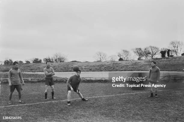 Soccer players of the Plymouth Argyle FC team in training, UK, January 1924; they are Jack Leslie, Bob Preston, Percy Cherrett, Jimmy Dickinson.