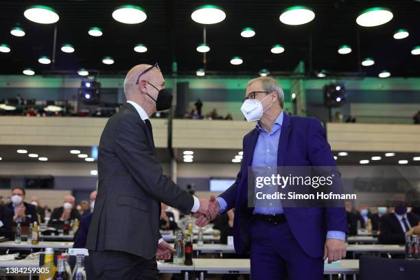 Peter Peters congratulates newly elected DFB President Bernd Neuendorf during the 44th Ordinary DFB-Bundestag at World Conference Center Bonn on...