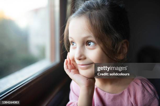 happy waiting - kid day dreaming stock pictures, royalty-free photos & images