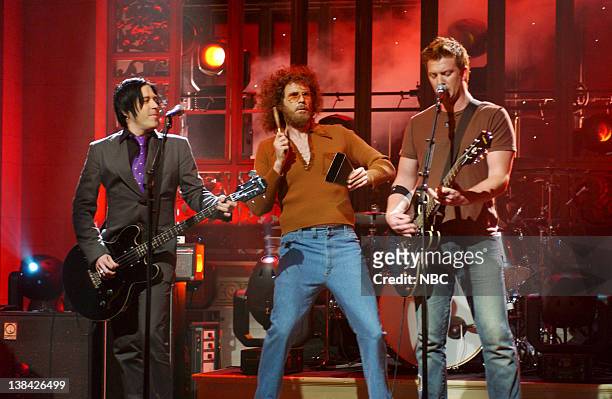 Episode 19 -- Aired -- Pictured: Will Ferrell as Gene Frenkle onstage with musical guests Queens of the Stone Age