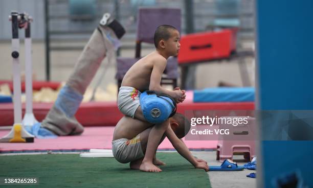 Gymnasts of Taiyuan City's gymnastics team take part in a training session on March 11, 2022 in Taiyuan, Shanxi Province of China.
