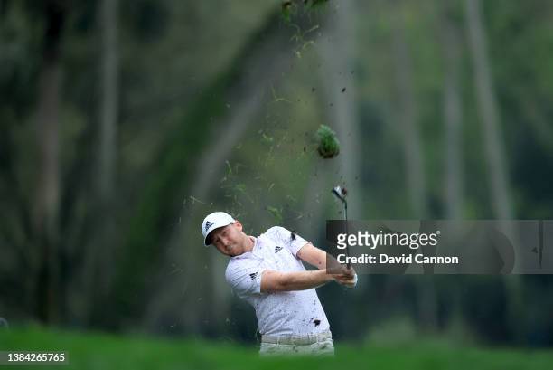 Daniel Berger of The United States plays his second shot on the par 4, seventh hole during the rain delayed completion of the first round of THE...