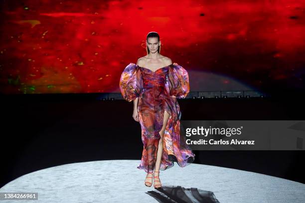 Model walks the runway at the Hannibal Laguna fashion show during Mercedes Benz Fashion Week Madrid March 2022 edition at Ifema on March 11, 2022 in...