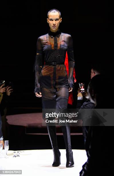 Model Bella Hadid walks the runway during the Burberry A/W 2023 Womenswear Collection Presentation on March 11, 2022 in London, England.