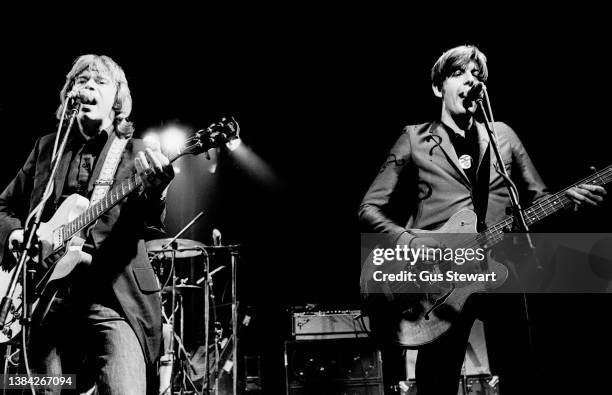 Dave Edmunds and Nick Lowe of Rockpile perform on stage at the Roundhouse, London, England, on October 17, 1978.