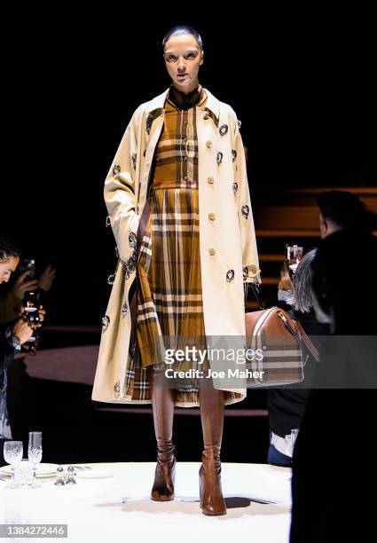 Model walks the runway during the Burberry A/W 2023 Womenswear Collection Presentation on March 11, 2022 in London, England.