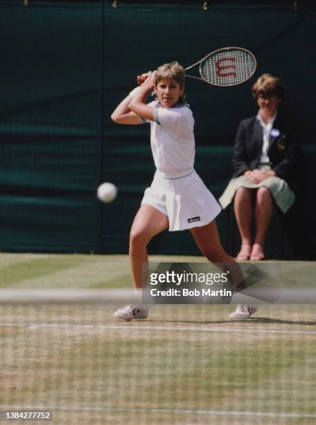 Chris Evert Lloyd from the United States plays a double handed return shot against compatriot Martina Navratilova during their Women's Singles Final...