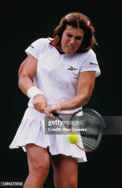Jennifer Capriati from the United States plays a double handed forehand return shot against compatriot Lori McNeil during their Women's Singles...