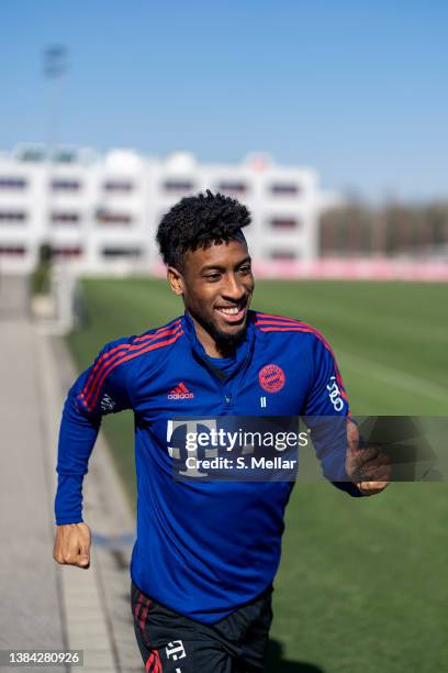 Kingsley Coman of FC Bayern Muenchen smiles during a training session at Saebener Strasse training ground on March 11, 2022 in Munich, Germany.