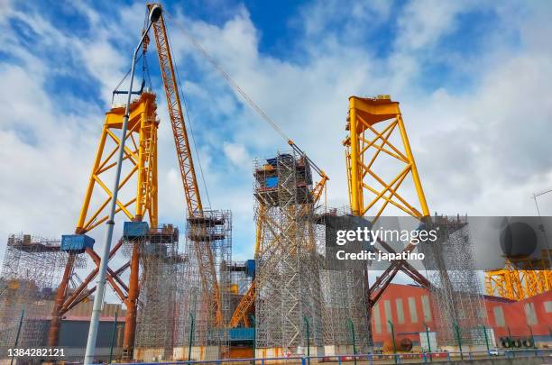 metallic structures, called jackets, construlled in a shipyard. - naval bases stock pictures, royalty-free photos & images