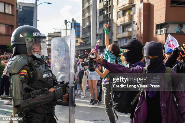 Women take part in the International women's Day demonstrations in Medellin - Antioquia, Colombia on March 8, 2022. Demonstrations ended in clashes...