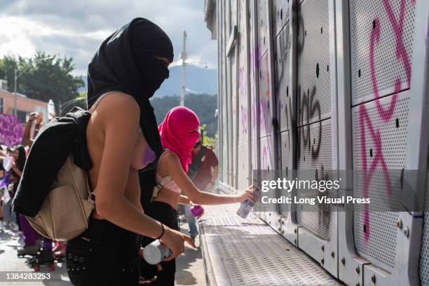 Women take part in the International women's Day demonstrations in Medellin - Antioquia, Colombia on March 8, 2022. Demonstrations ended in clashes...