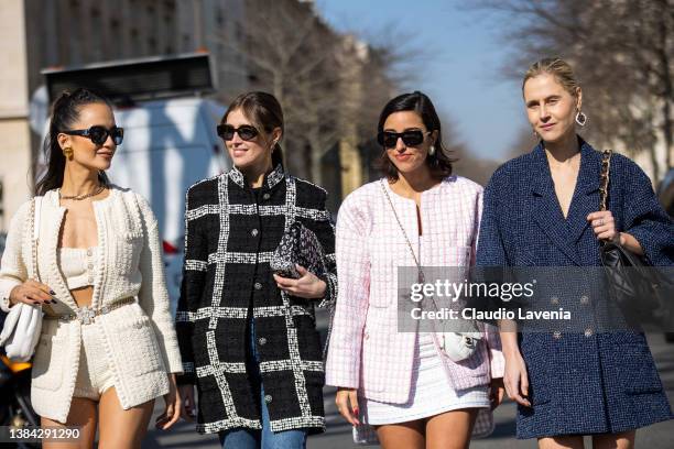 Anna Rosa Vitiello wearing a cream top with matching jacket and shorts and white Chanel bag, Darja Barannik wearing a black and white jacket and...