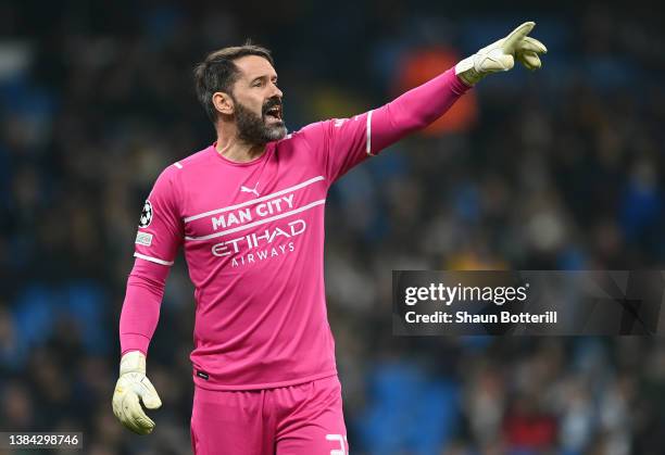 Scott Carson of Manchester City shouts instructions during the UEFA Champions League Round Of Sixteen Leg Two match between Manchester City and...