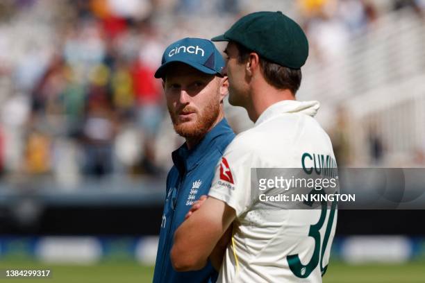 England's captain Ben Stokes and Australia's Pat Cummins chat on the field after Australia win on day five of the second Ashes cricket Test match...
