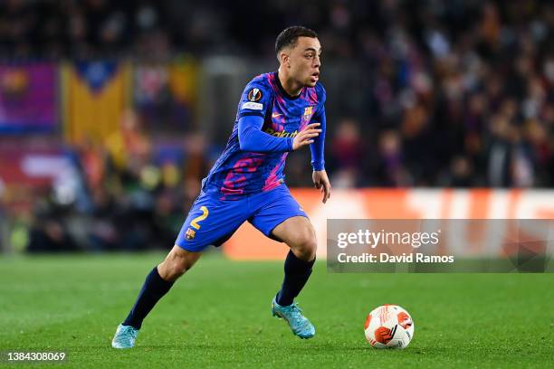 Sergiño Dest of FC Barcelona runs with the ball during the UEFA Europa League Round of 16 Leg One match between FC Barcelona and Galatasaray at Camp...