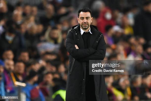 Head coach Xavi Hernandez of FC Barcelona looks on during the UEFA Europa League Round of 16 Leg One match between FC Barcelona and Galatasaray at...