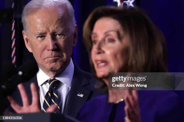 Speaker of the House Rep. Nancy Pelosi speaks as she introduces President Joe Biden during the 2022 House Democratic Caucus Issues Conference March...