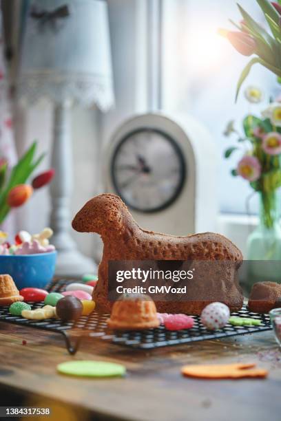 preparing easter lamb cake - easter lamb stock pictures, royalty-free photos & images