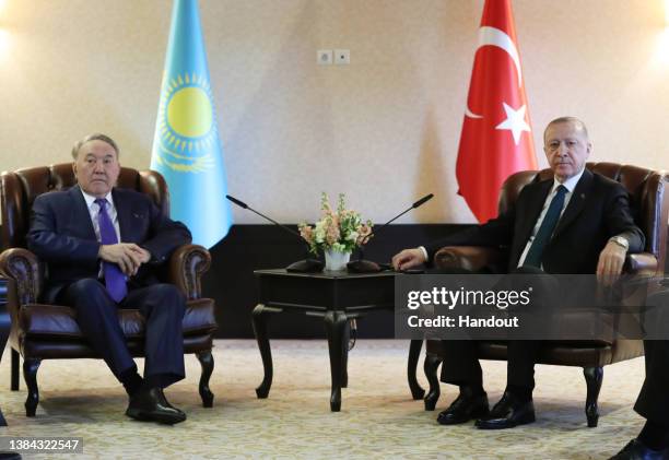 In this handout from the Presidential Press Office, Turkish President Recep Tayyip Erdogan met with Kazakhstan Founding President Nazarbayev at the...