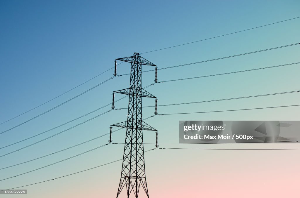Low angle view of electricity pylon against clear sky,River Ver Trail,St Albans,United Kingdom,UK