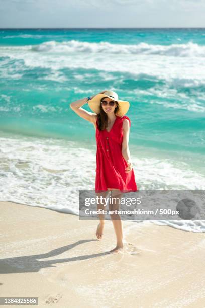 girl in red on the beach caribean sea,quintana roo,mexico - sarong imagens e fotografias de stock