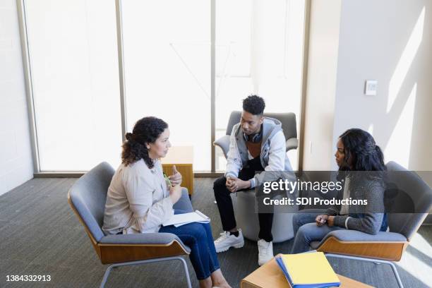 school advisor meets with students - guidance counselor stock pictures, royalty-free photos & images