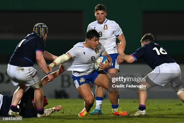 Luca Rizzoli of Italy U20 competes for the ball with Michael Jones and Duncan Hood of Scotland U20 during the Under-20 Six Nations Rugby match...