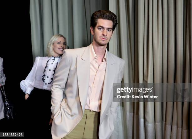 Marlee Matlin photobombs Andrew Garfield during the AFI Awards Luncheon at Beverly Wilshire, A Four Seasons Hotel on March 11, 2022 in Beverly Hills,...
