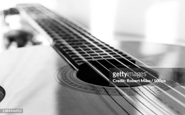 close-up of guitar - folk foto e immagini stock