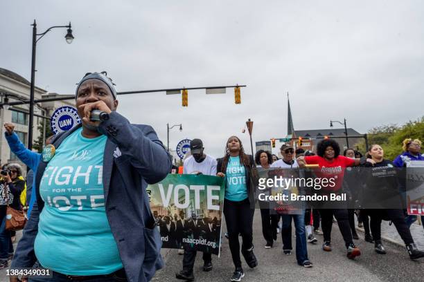 People march towards the Alabama State Capitol on March 11, 2022 in Montgomery, Alabama. Community residents, organizers, and activists concluded the...