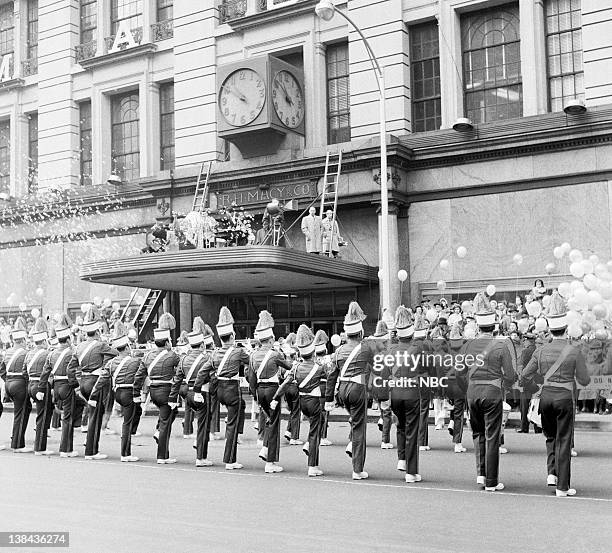 Pictured: A marching band plays during the 1954 Macy's Thanksgiving Day Parade