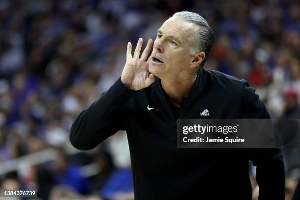 Head coach Jamie Dixon of the TCU Horned Frogs reacts in the first half against the Kansas Jayhawks during the semifinal game of the 2022 Phillips 66...