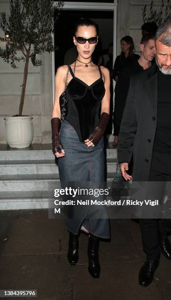 Bella Hadid seen attending a Burberry dinner at The Twenty Two on March 11, 2022 in London, England.