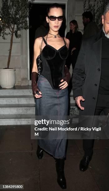 Bella Hadid seen attending a Burberry dinner at The Twenty Two on March 11, 2022 in London, England.