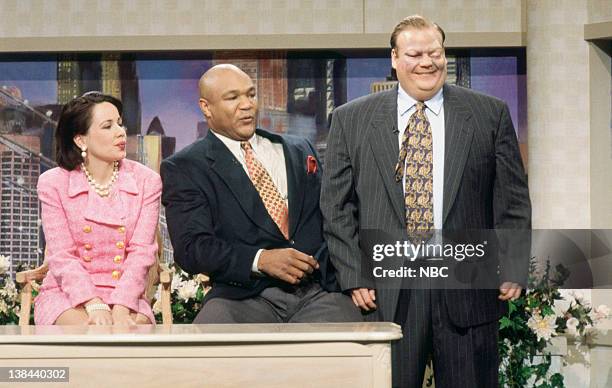 Episode 9 -- Aired -- Pictured: Janeane Garofalo as host, George Foreman, Chris Farley as Steve Gallagher during "Looking Good" skit on December 17,...