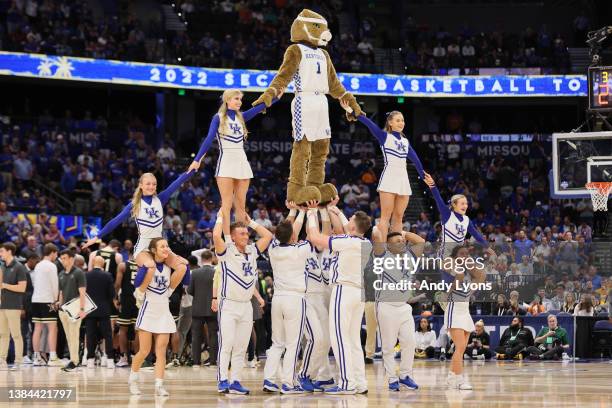 Kentucky Wildcats cheerleaders cheer during a timeout during the second half against the Vanderbilt Commodores in the Quarterfinal game of the SEC...