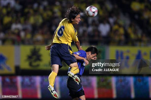 Tomi Shimomura of JEF United Chiba and Takahiro Futagawa of Gamba Osaka compete for the ball during the J.League J1 match between JEF United Chiba...