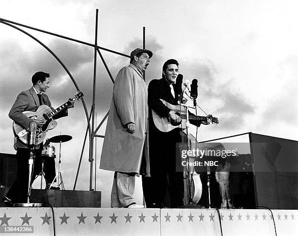 Episode 10 -- aired -- Pictured: Guitarist, Scotty Moore, host Milton Berle, musician Elvis Presley on the deck of the USS Hancock aircraft carrier.