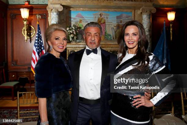 Julie Opperman, Sylvester Stallone, and Lynda Carter at the Justice Ruth Bader Ginsburg Woman of Leadership Award on March 11, 2022 in Washington, DC...