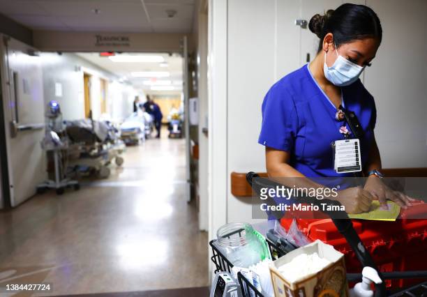 Lab technician Alejandra Sanchez works in the Emergency Department at Providence St. Mary Medical Center on March 11, 2022 in Apple Valley,...