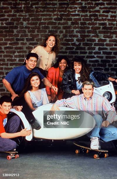 Season 4 -- Pictured: Dustin Diamond as Screech Powers, Tiffani-Amber Thiessen as Kelly Kapowski, Mario Lopez as A.C. Slater, Elizabeth Berkley as...