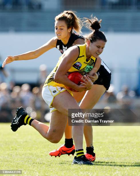 Meagan Kiely of Richmond marks the ball during the round 10 AFLW match between the Collingwood Magpies and the Richmond Tigers at Victoria Park on...