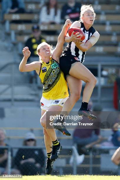 Sophie Alexander of Collingwood marks the ball during the round 10 AFLW match between the Collingwood Magpies and the Richmond Tigers at Victoria...