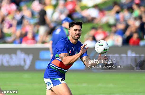 Shaun Johnson of the Warriors catches the ball during the warm-up before the round one NRL match between the New Zealand Warriors and the St George...