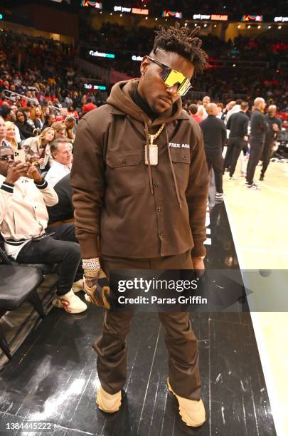 Player Antonio Brown attends the game between the Los Angeles Clippers and the Atlanta Hawks at State Farm Arena on March 11, 2022 in Atlanta,...